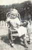 Lois Van Pelt in chair in yard, Mar 1942, Glendale, CA