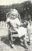 Lois Van Pelt in chair in yard, Mar 1942, Glendale, CA